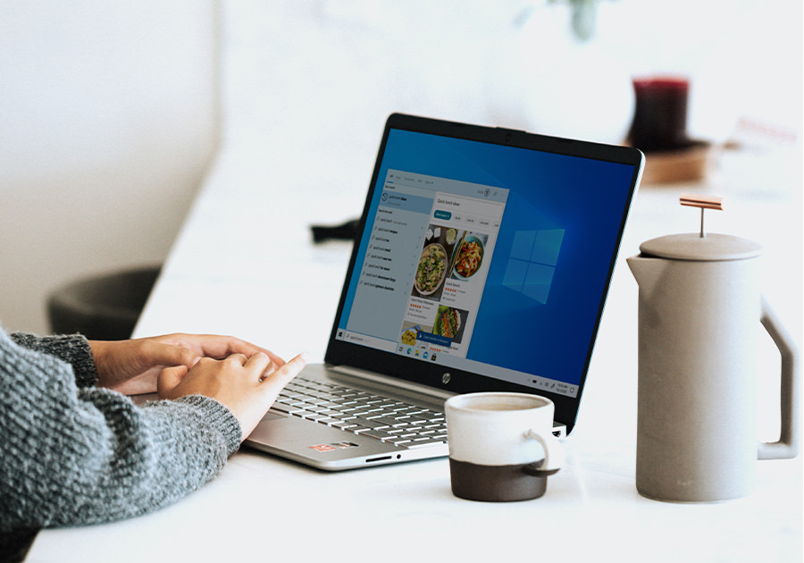 stock photo of person working on a computer.